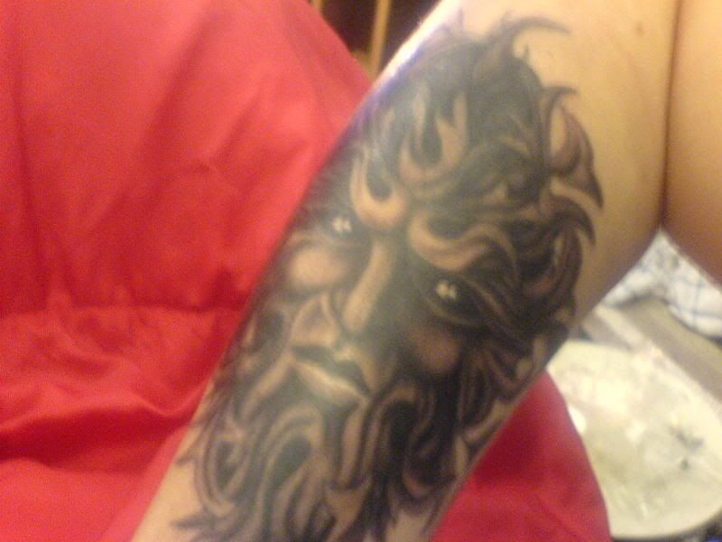 Sham sent in this photo of his right arm piece, a Green Man tattoo.