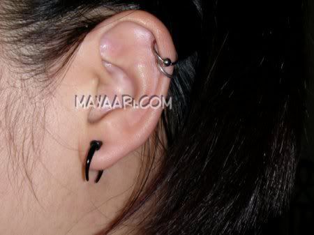 That's my left ear, with a 12g piercing. My right ear has a bit of scar 