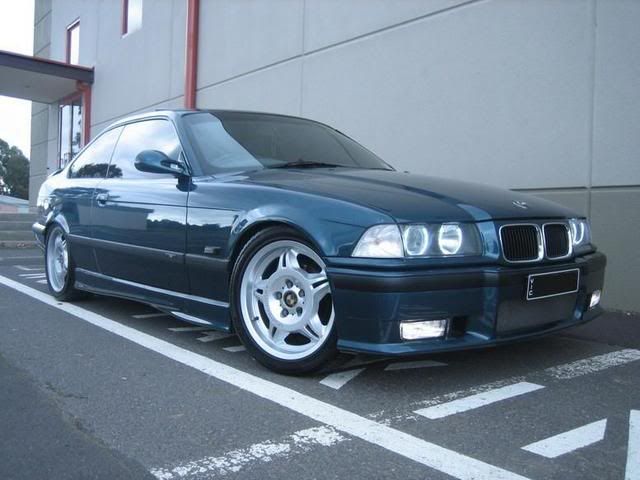 1995 BMW E36 318is Individual Metalic Aqua green purple in sunlight 