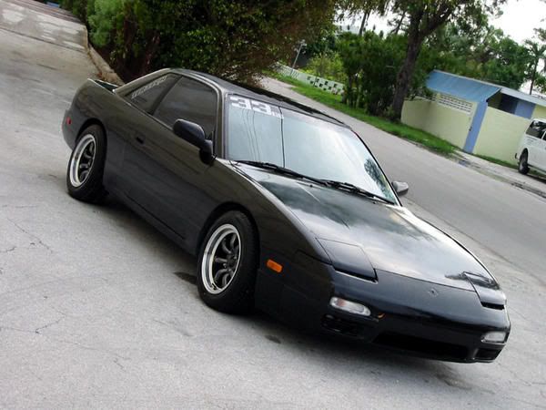 http://i26.photobucket.com/albums/c132/driftinblaze/tight240coupe.jpg