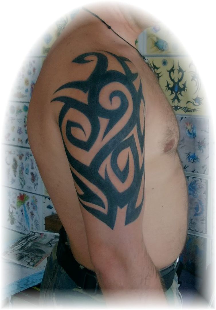 Classic tribal arm tattoo design